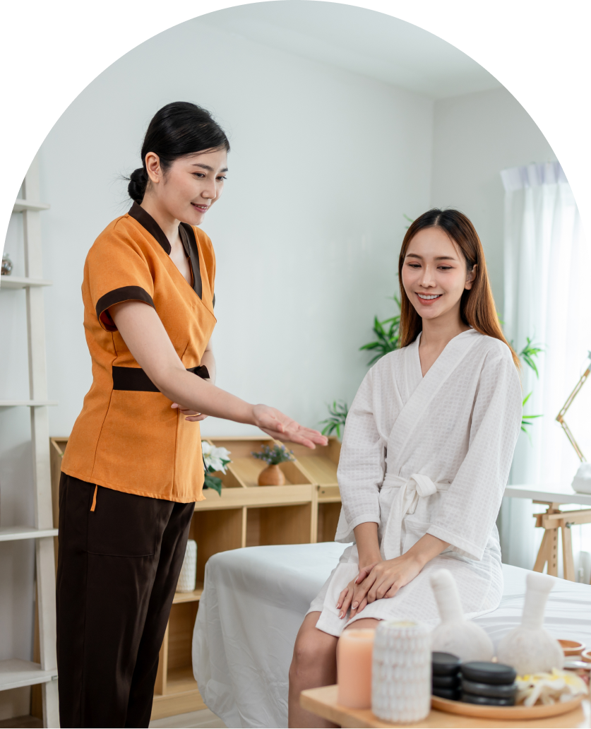 Woman in robe at spa treatment room